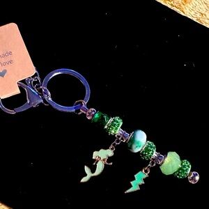Handmade Green Pandora Like Purse Key Chain. Lighting Bolt and Mermaid Charms.